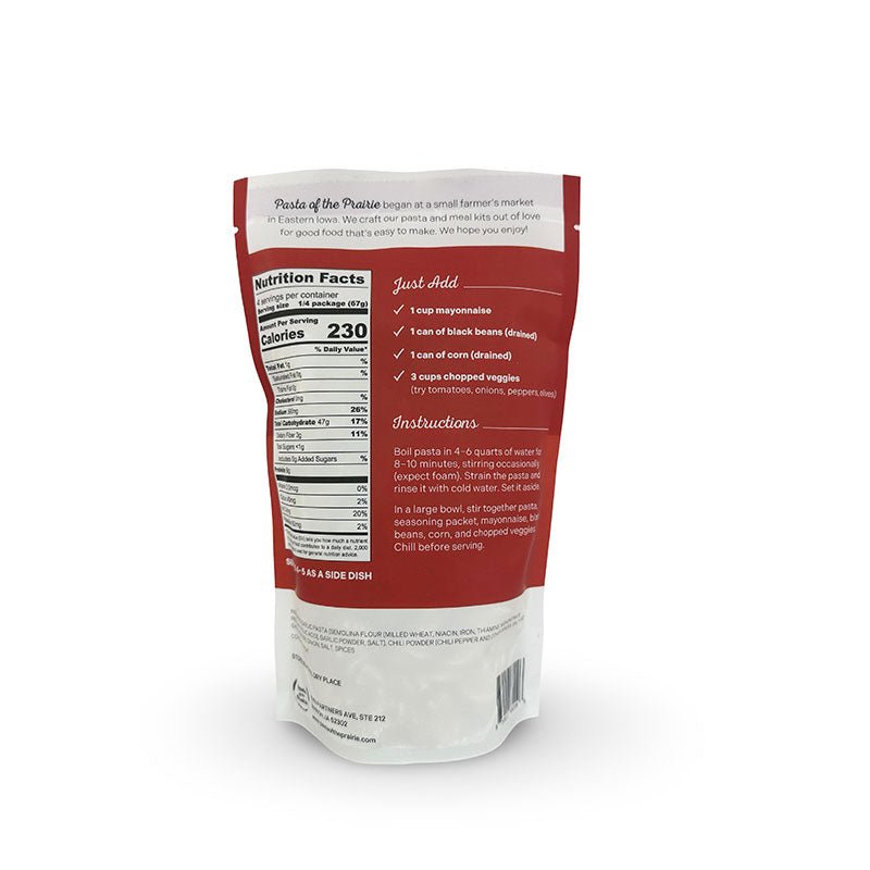 Back view of fiesta pasta salad packaging with nutritional information and ingredients listed on a white background