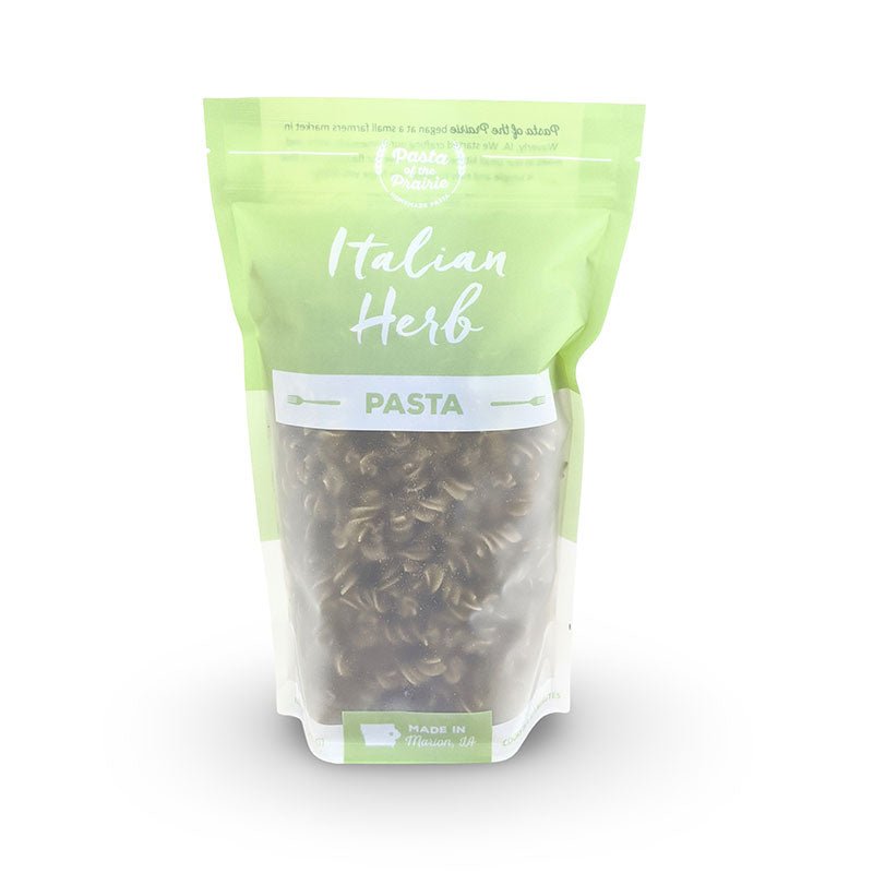 Packaged Italian herb pasta on a white background