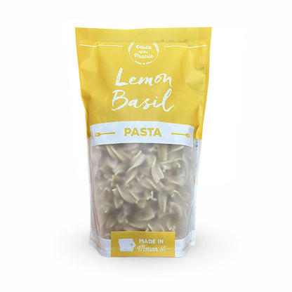 Packaged lemon basil pasta on a white background