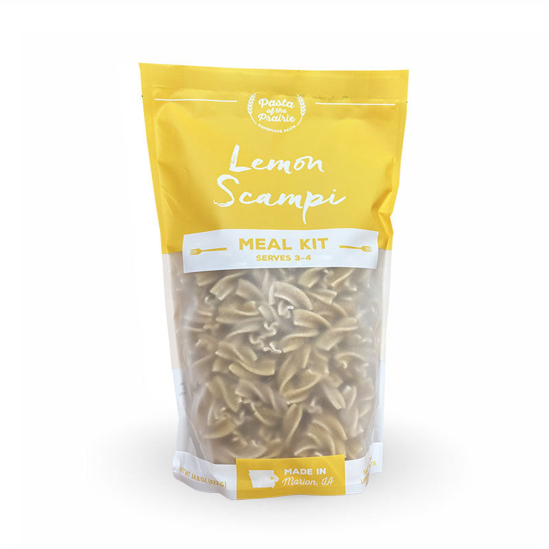 Package of lemon scampi meal kit on a white background