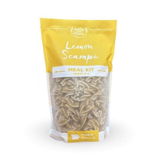 Package of lemon scampi meal kit on a white background
