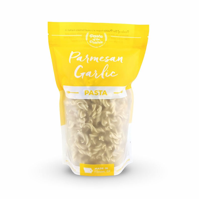 Packaged of parmesan garlic pasta on a white background