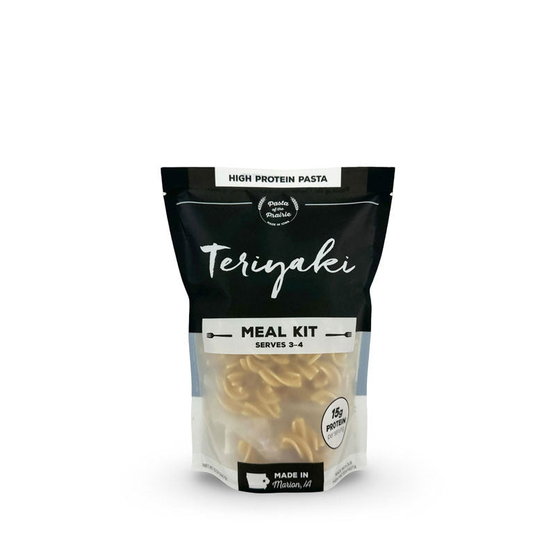 Bag of teriyaki meal kit with high protein pasta inside on a white background
