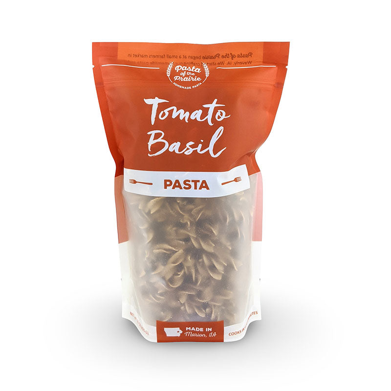 Bag of tomato basil pasta with on a white background