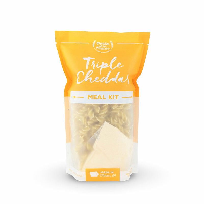 Triple cheddar meal kit packaging on a white background